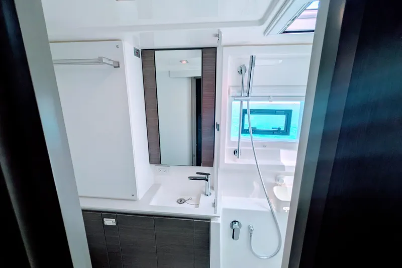Slide: The Image of Modern bathroom interior of 2023 Leopard 42 yacht with sleek fixtures and window view. - 90