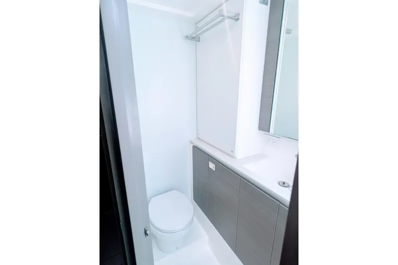 Slide: The Image of Modern bathroom in 2023 Leopard 42 yacht, featuring sleek design and compact layout. - 91