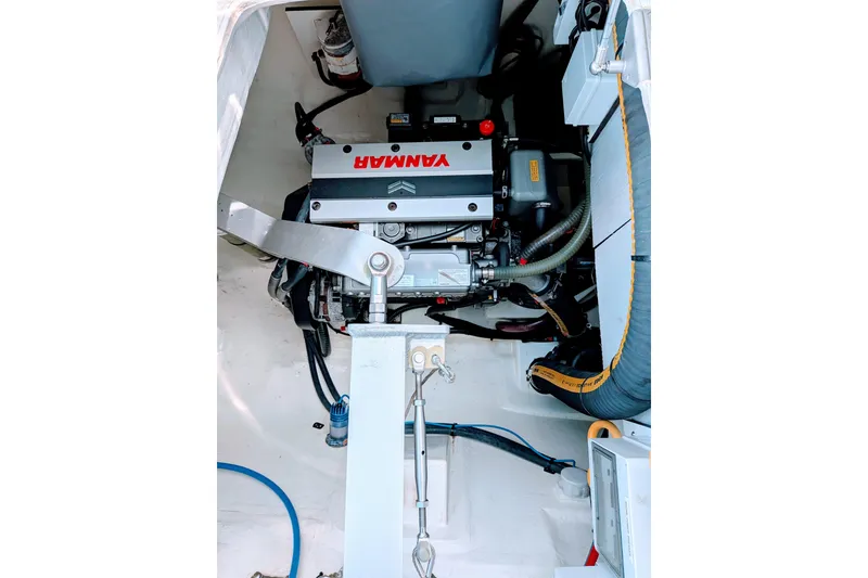 Slide: The Image of Engine compartment of a 2023 Leopard 42 yacht featuring a Yanmar engine. - 92