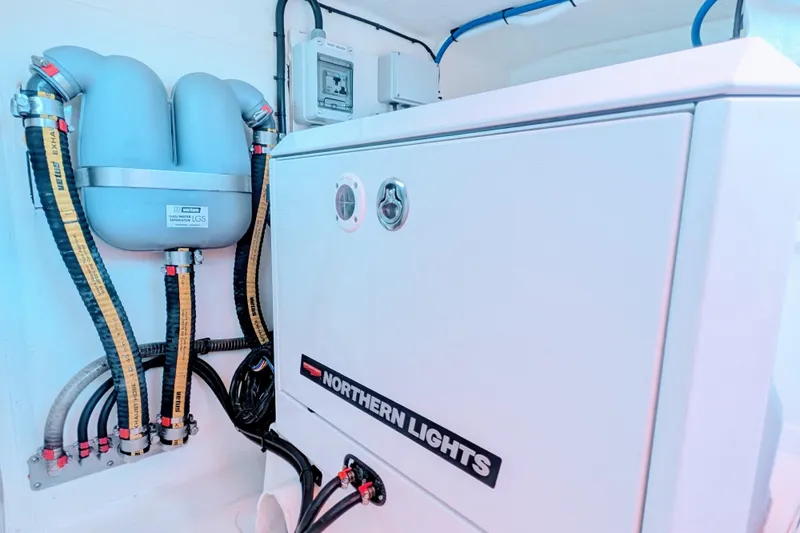 Slide: The Image of Engine room of 2023 Leopard 42 yacht with Northern Lights generator and exhaust system. - 96
