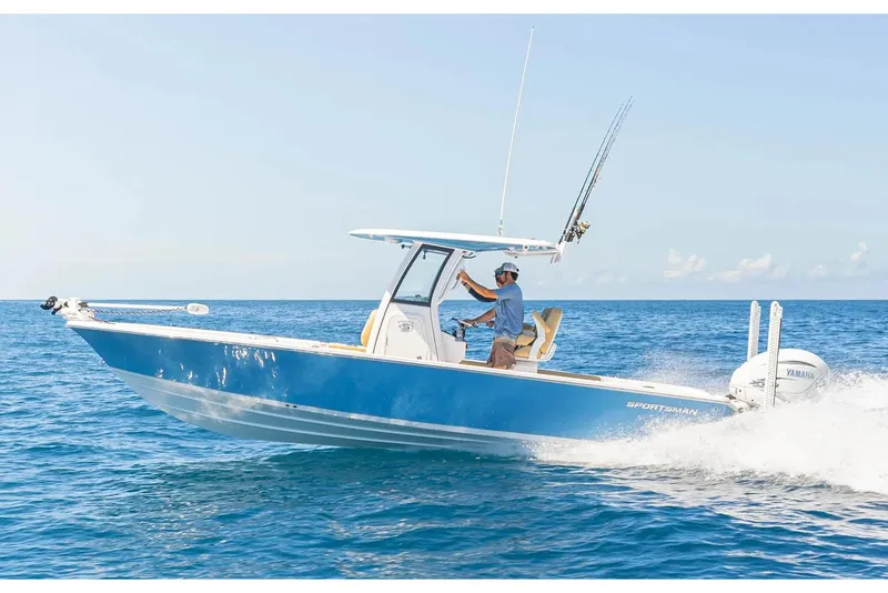 Slide: The Image of Manufacturer Provided Image: 2025 Sportsman Masters 267 Bay Boat cruising on open water. - 2