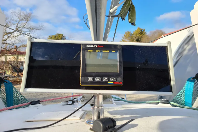 Slide: The Image of Cockpit view of 1999 Corsair F-24 MKII sailboat with navigation display. - 9