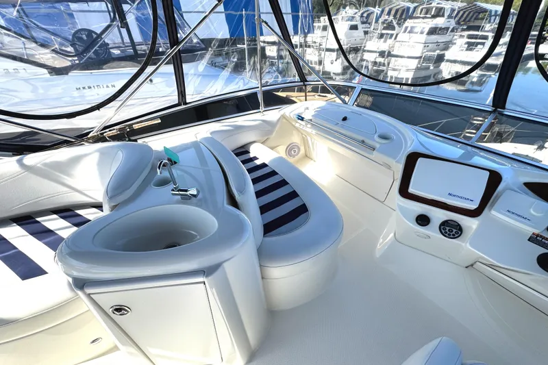 Slide: The Image of Luxurious interior of 2008 Meridian 391 Sedan yacht with modern navigation equipment. - 15