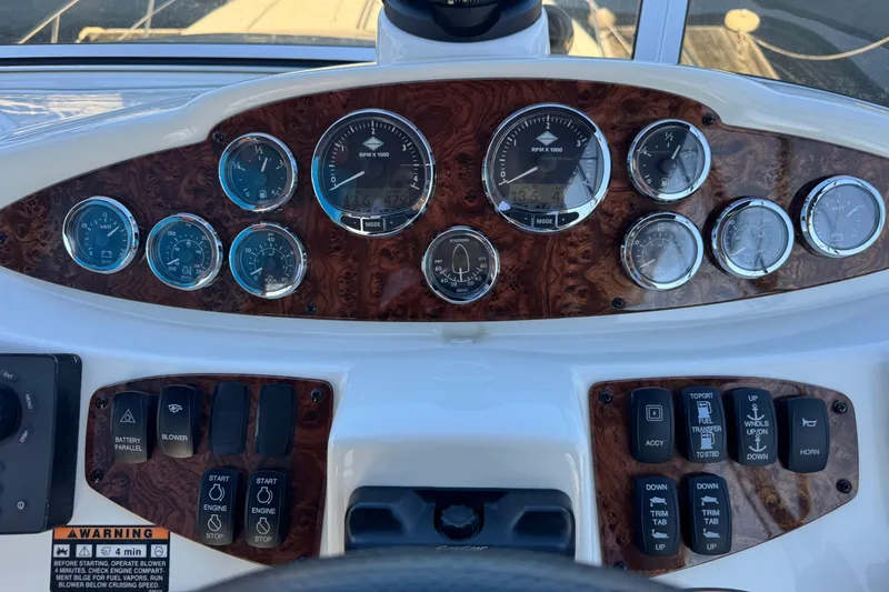 Slide: The Image of Dashboard of a 2008 Meridian 391 Sedan boat with gauges and controls. - 22