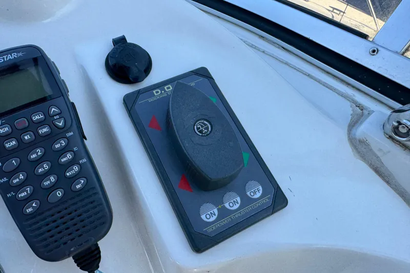 Slide: The Image of Control panel and radio on 2008 Meridian 391 Sedan boat dashboard. - 24