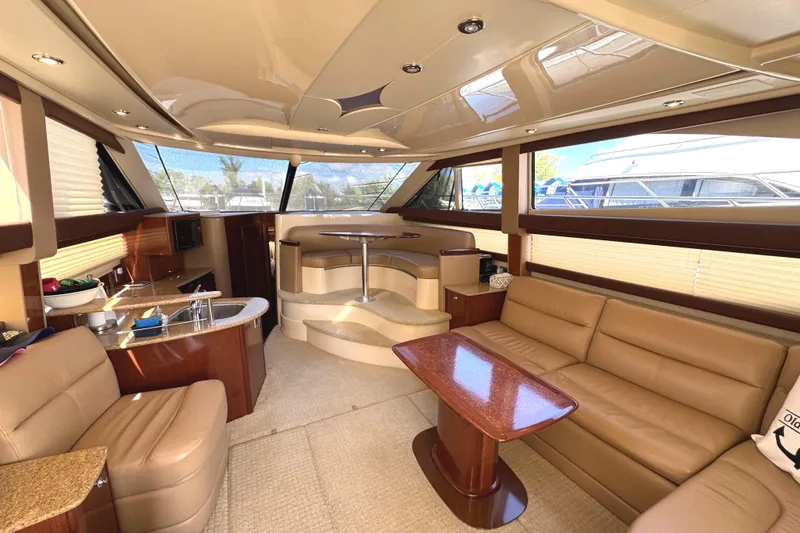Slide: The Image of Luxurious interior of a 2008 Meridian 391 Sedan yacht with plush seating and modern amenities. - 28