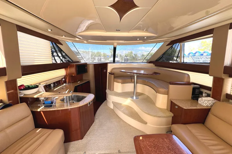 Slide: The Image of Luxurious interior of 2008 Meridian 391 Sedan yacht with elegant seating and modern amenities. - 29