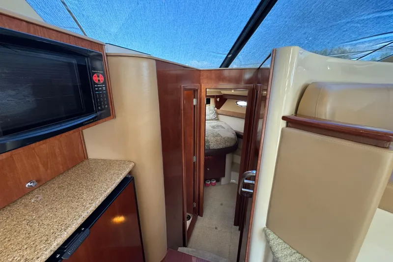 Slide: The Image of Interior of 2008 Meridian 391 Sedan yacht with kitchenette and cozy cabin. - 34