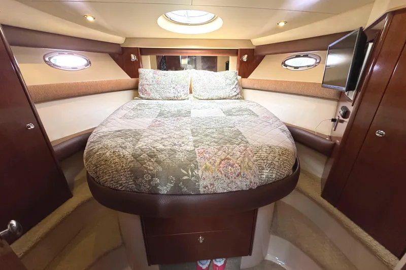 Slide: The Image of Luxurious 2008 Meridian 391 Sedan cabin with cozy bed and elegant wood finishes. - 36