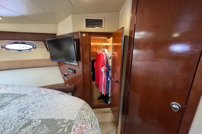 Slide: The Image of Interior of 2008 Meridian 391 Sedan with closet, TV, and bed. - 39