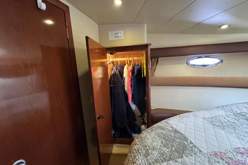 Slide: The Image of Interior of 2008 Meridian 391 Sedan with open closet and cozy bedding. - 43