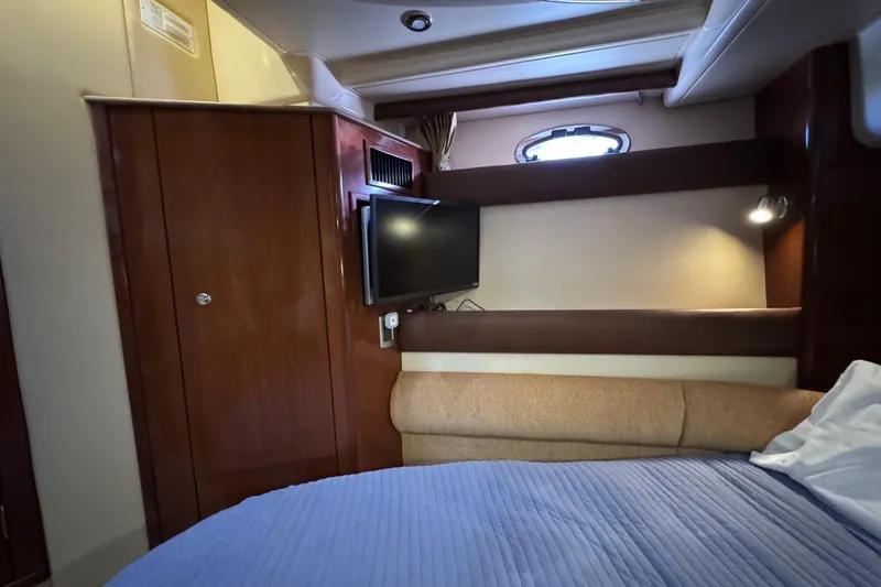 Slide: The Image of Interior of 2008 Meridian 391 Sedan yacht with cozy cabin and TV. - 46