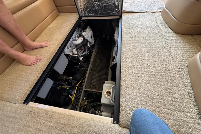 Slide: The Image of 2008 Meridian 391 Sedan engine compartment with beige interior and visible machinery. - 48