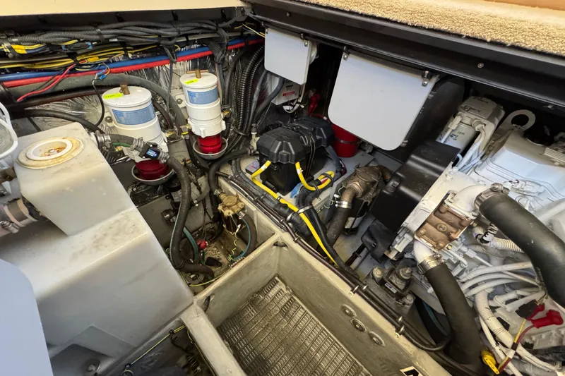 Slide: The Image of Engine room of a 2008 Meridian 391 Sedan, showcasing mechanical components and wiring. - 51