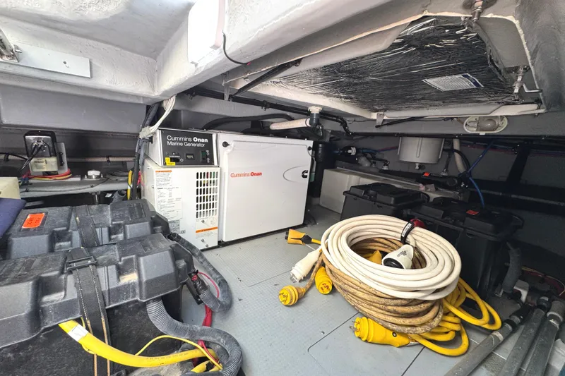 Slide: The Image of Engine room of 2008 Meridian 391 Sedan with Cummins Onan marine generator. - 56