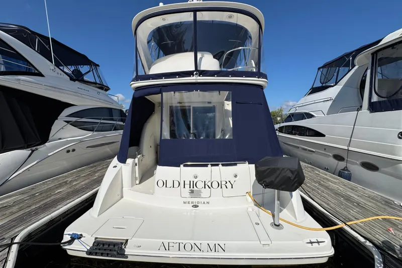 Slide: The Image of 2008 Meridian 391 Sedan yacht docked, featuring "Old Hickory" name, Afton, MN. - 6