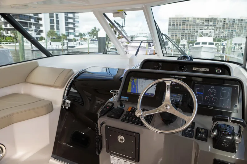 Slide: The Image of Pursuit 38 TRACKER - Helm Station - 14