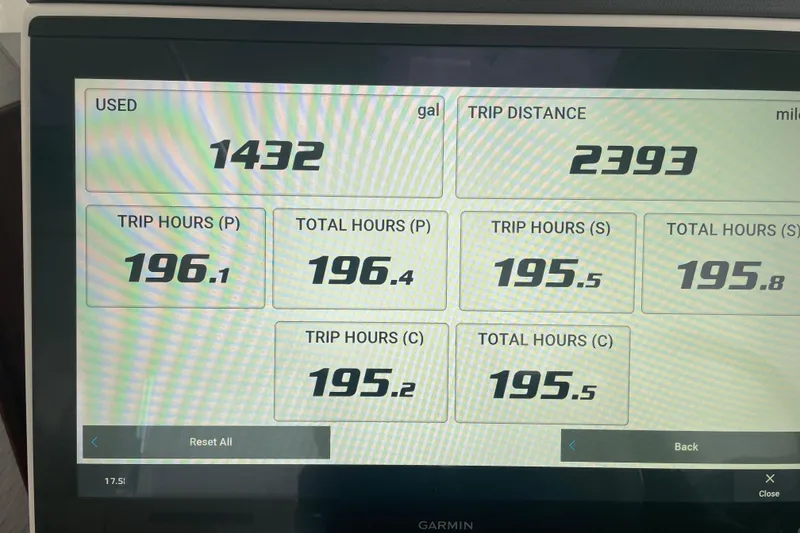 Slide: The Image of Display screen showing fuel usage and trip data for 2023 Pursuit OS 445 Offshore. - 17