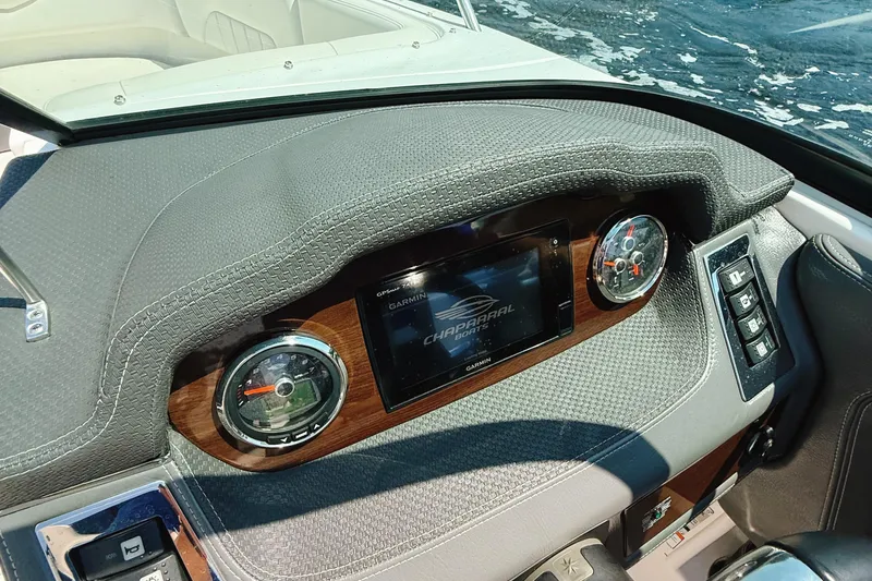 Slide: The Image of Dashboard of 2017 Chaparral 227 SSX boat with gauges and Garmin display. - 18
