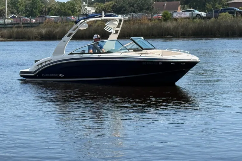 Slide: The Image of 2017 Chaparral 227 SSX boat cruising on a calm river. - 5