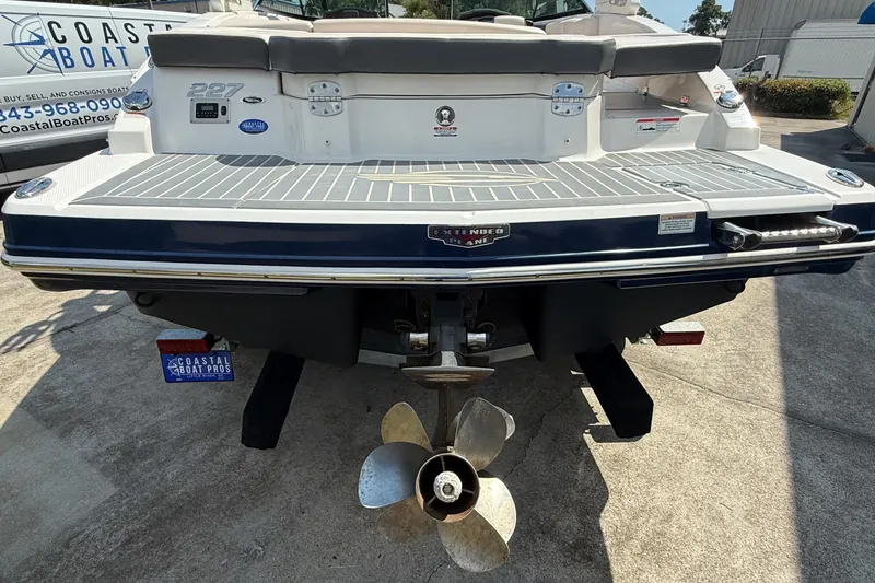 Slide: The Image of 2017 Chaparral 227 SSX boat rear view with propeller and swim platform. - 6
