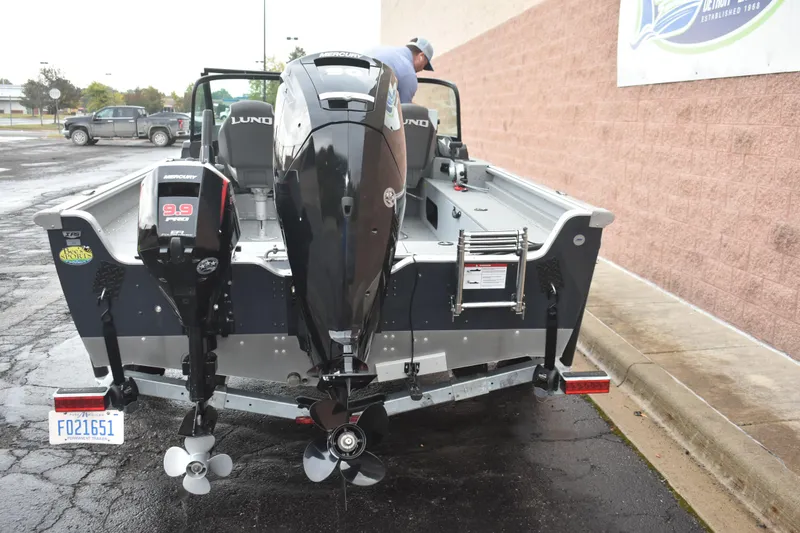 Slide: The Image of 2024 Lund 1875 Alaskan Sport boat with dual Mercury outboard motors. - 26