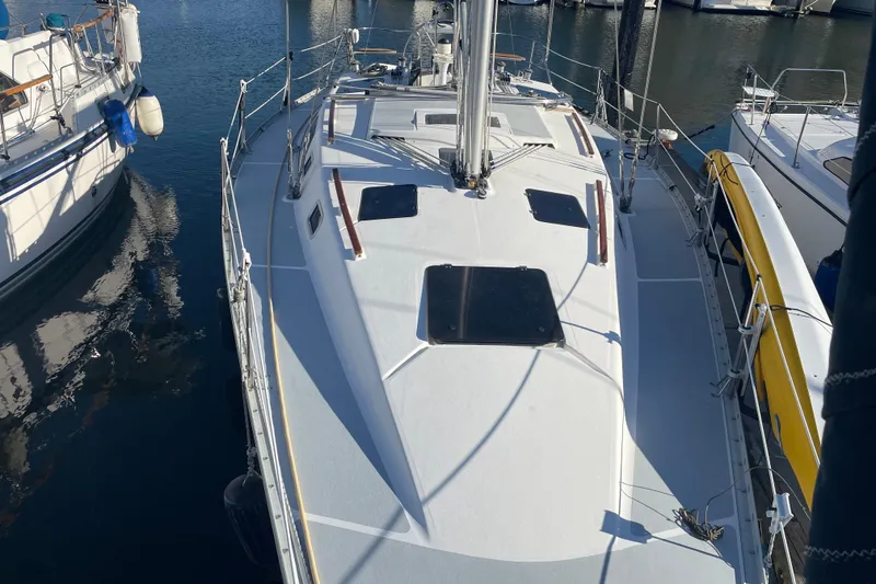 Slide: The Image of 1994 Hunter Legend 37.5 sailboat docked at marina, top deck view. - 3