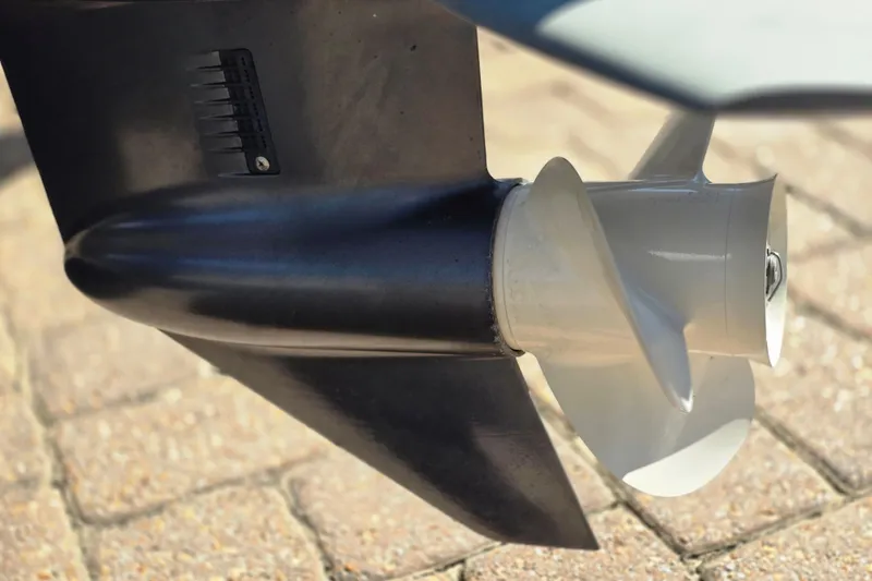 Slide: The Image of 2011 Novurania DL 550 boat engine close-up, showcasing motor and mounting details. - 11