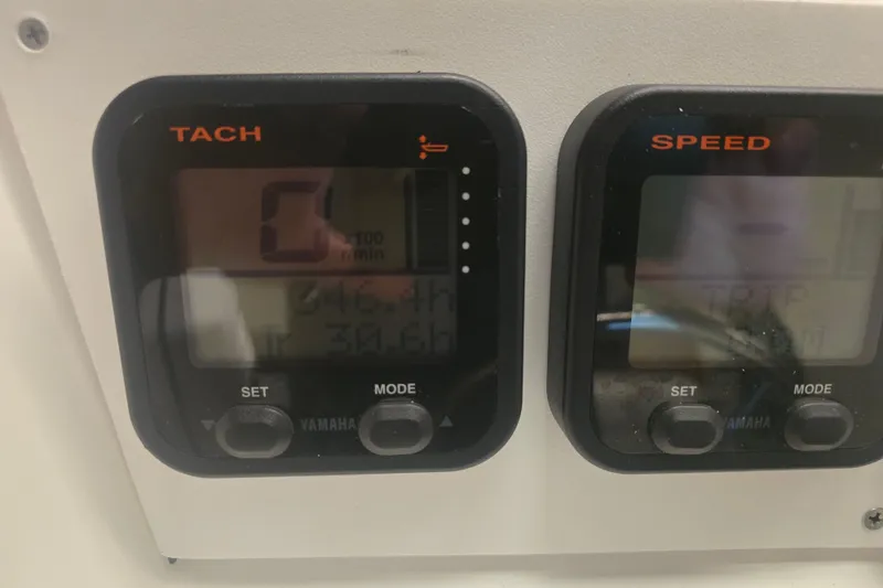 Slide: The Image of Close-up of Yamaha 115 outboard motor cover on 2011 Novurania DL 550 boat. - 12