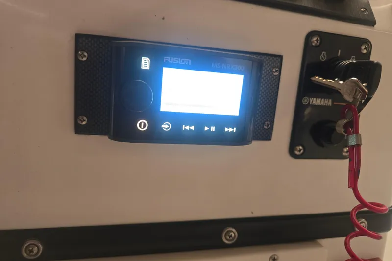 Slide: The Image of Novurania DL 550 2011 dashboard with Yamaha tachometer and speedometer displays. - 14