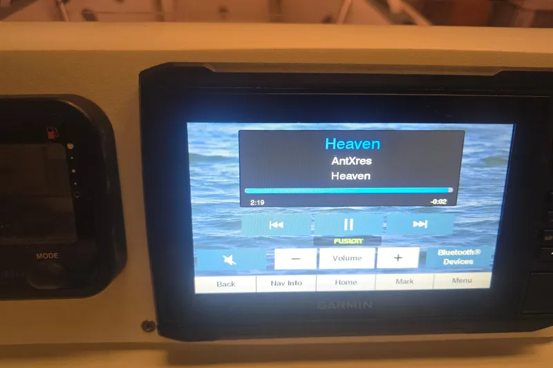 Slide: The Image of Garmin display on 2011 Novurania DL 550 showing music track "Heaven" by AntXres. - 15