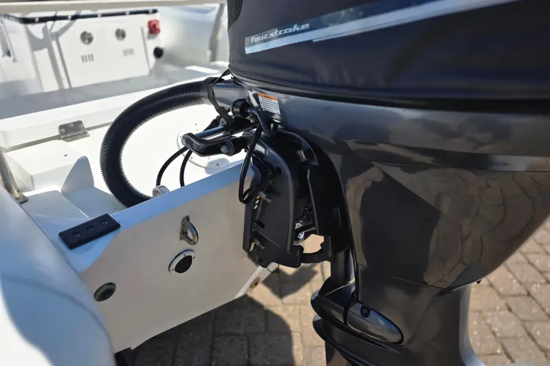 Slide: The Image of Close-up of textured white upholstery on a 2011 Novurania DL 550 boat. - 9