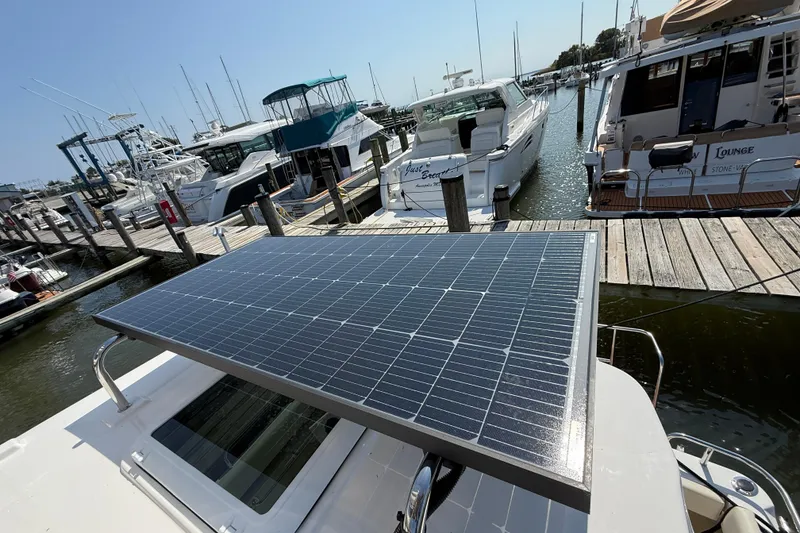 Slide: The Image of Solar panel on 2026 Ranger Tugs R-29 CB at marina dock. - 9