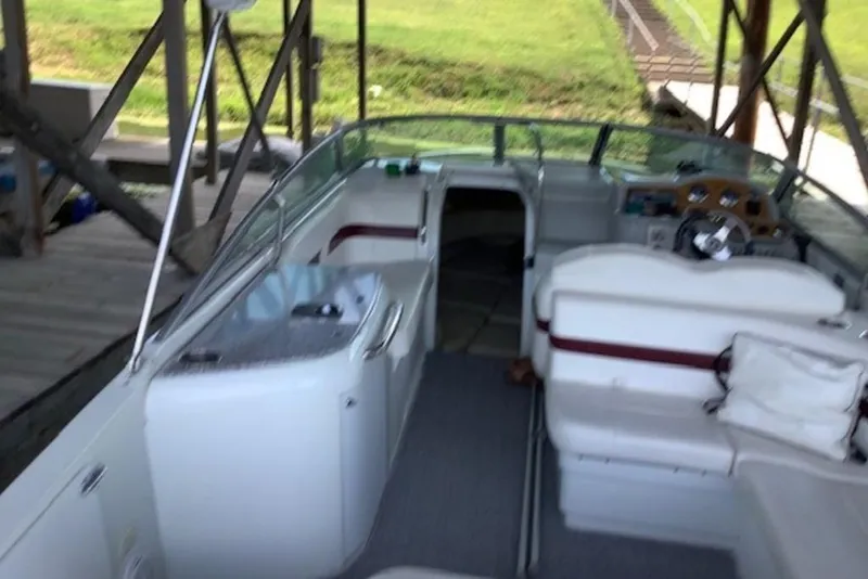 Slide: The Image of 2007 Formula 260 Sun Sport boat interior with seating and steering wheel. - 7