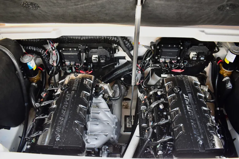 Slide: The Image of Engine compartment of 2022 Yamaha Boats 252XE, showcasing dual high-output engines. - 38
