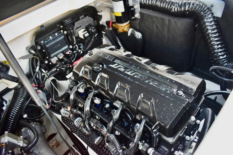 Slide: The Image of Engine compartment of 2022 Yamaha Boats 252XE, showcasing high-output engine components. - 40