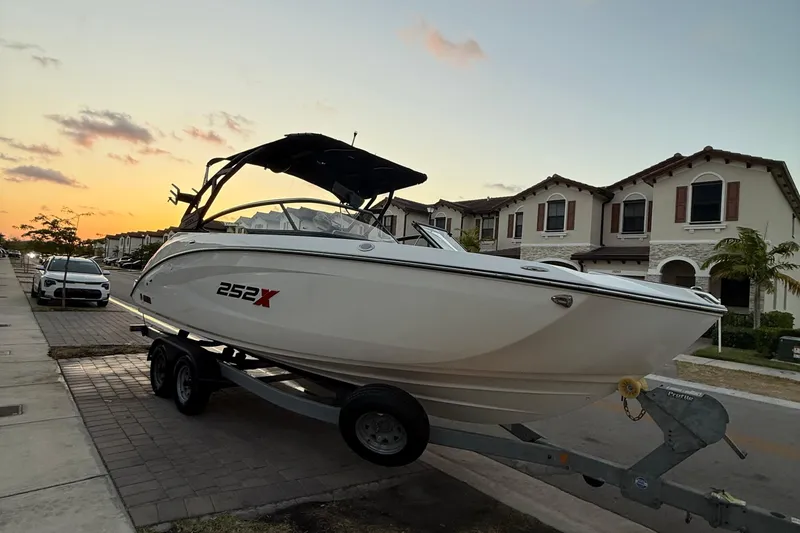 Slide: The Image of Rear view of a 2022 Yamaha Boats 252XE jet propulsion system on a trailer. - 9
