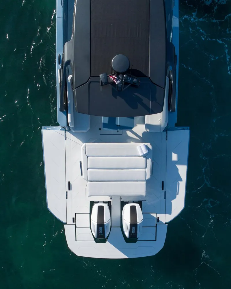 Slide: The Image of Aerial view of 2023 Limitless Seas XLV luxury boat on water. - 12