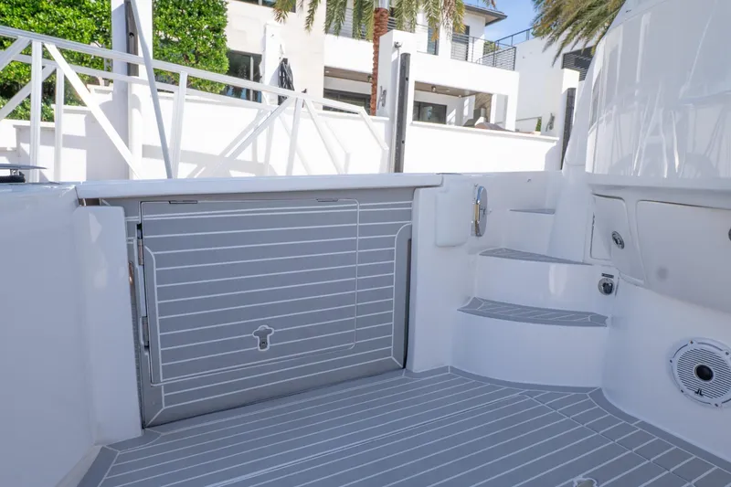 Slide: The Image of 2022 Intrepid 477 Evolution boat deck with sleek design and modern features. - 6