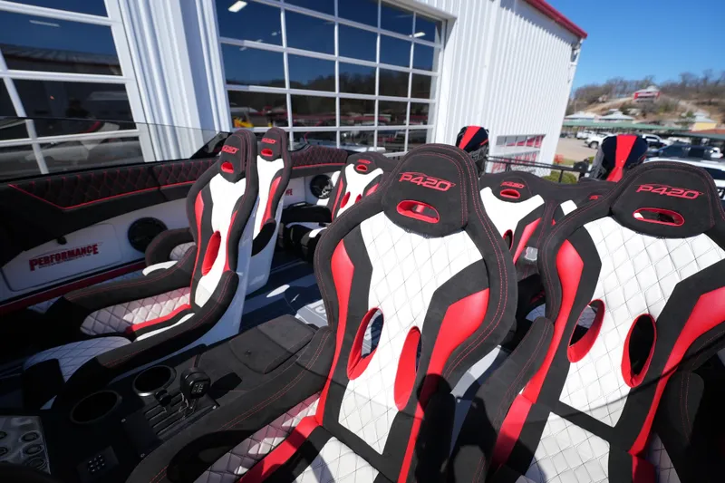 Slide: The Image of 2025 Performance Powerboats P420 interior with sporty red, black, and white seats. - 10