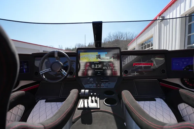 Slide: The Image of Interior of 2025 Performance Powerboats P420, featuring sleek seating and modern dashboard design. - 14