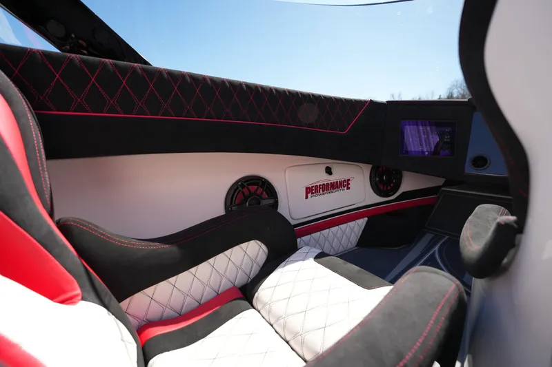 Slide: The Image of Interior of 2025 Performance Powerboats P420 with sleek seats and advanced dashboard. - 15