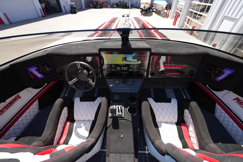 Slide: The Image of 2025 Performance Powerboats P420 interior with red and white seating, showcasing luxury design. - 19