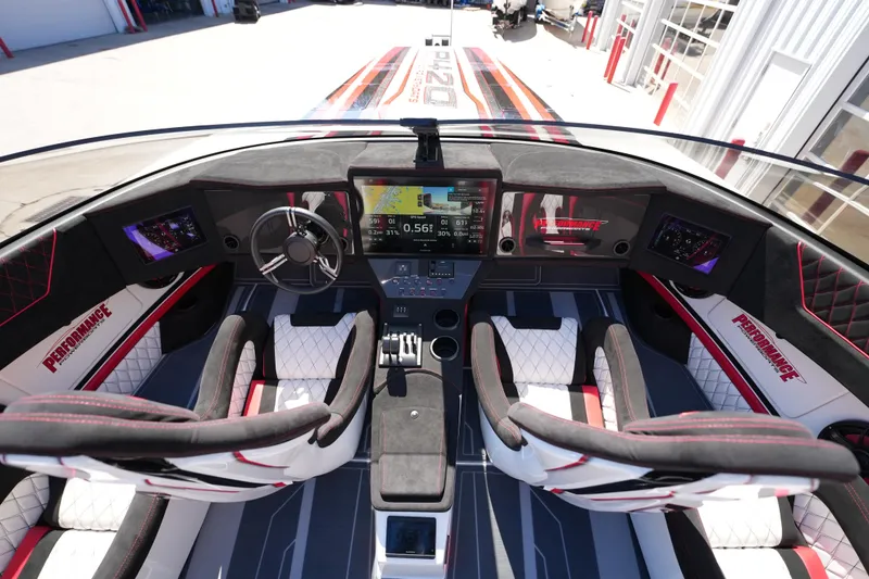 Slide: The Image of Interior of 2025 Performance Powerboats P420 with luxurious seating and modern dashboard. - 20