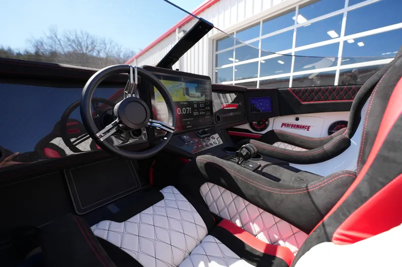 Slide: The Image of Interior of 2025 Performance Powerboats P420, featuring sleek, modern design and advanced controls. - 24