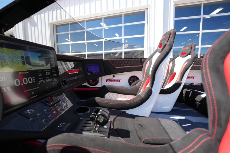 Slide: The Image of Interior of 2025 Performance Powerboats P420, featuring sleek, modern seating and dashboard design. - 25