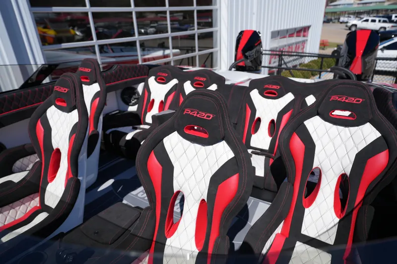 Slide: The Image of 2025 Performance Powerboats P420 with Racing 500 engine, showcased outdoors. - 7