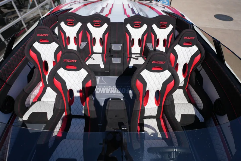 Slide: The Image of Interior of 2025 Performance Powerboats P420 with stylish red and white seats. - 8
