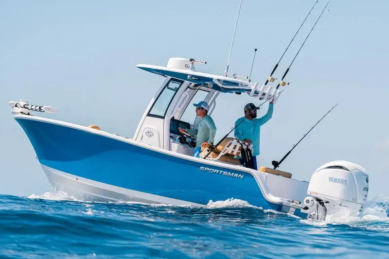 Slide: The Image of Manufacturer Provided Image: 2025 Sportsman Open 212 Center Console boat on ocean, two people fishing. - 2