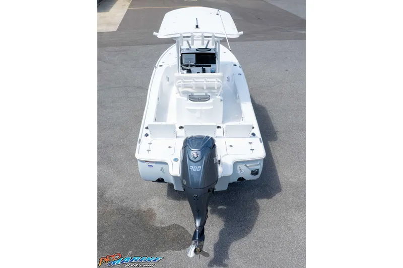 Slide: The Image of 2026 Sea Hunt BX 22 BR boat with powerful outboard motor, viewed from above. - 15